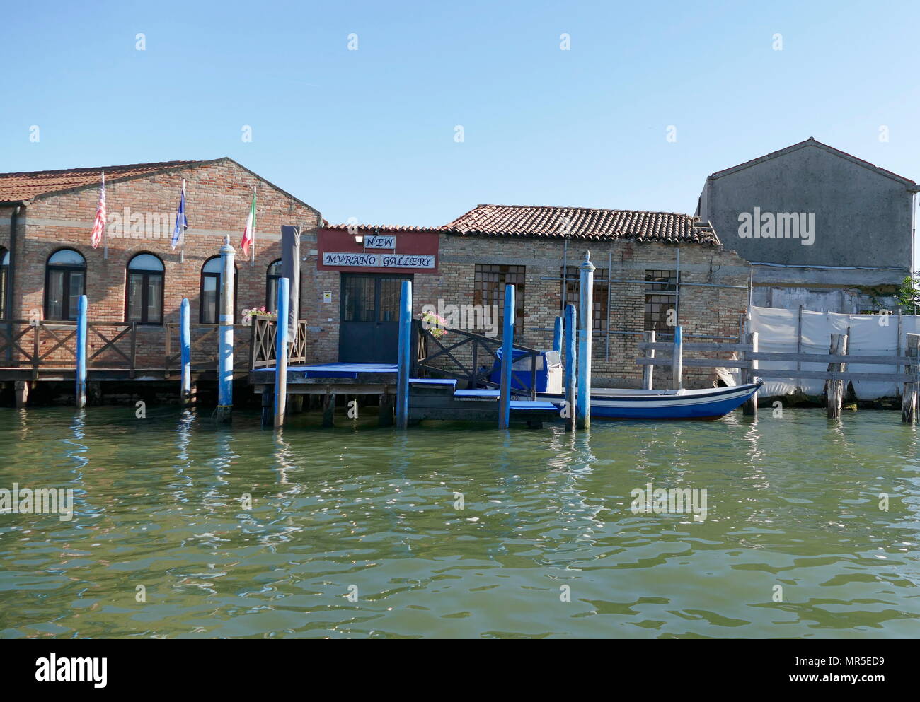 Murano in the Venetian Lagoon, northern Italy. It lies about 1.5 kilometres (0.9 miles) north of Venice. It is famous for its glass making Stock Photo