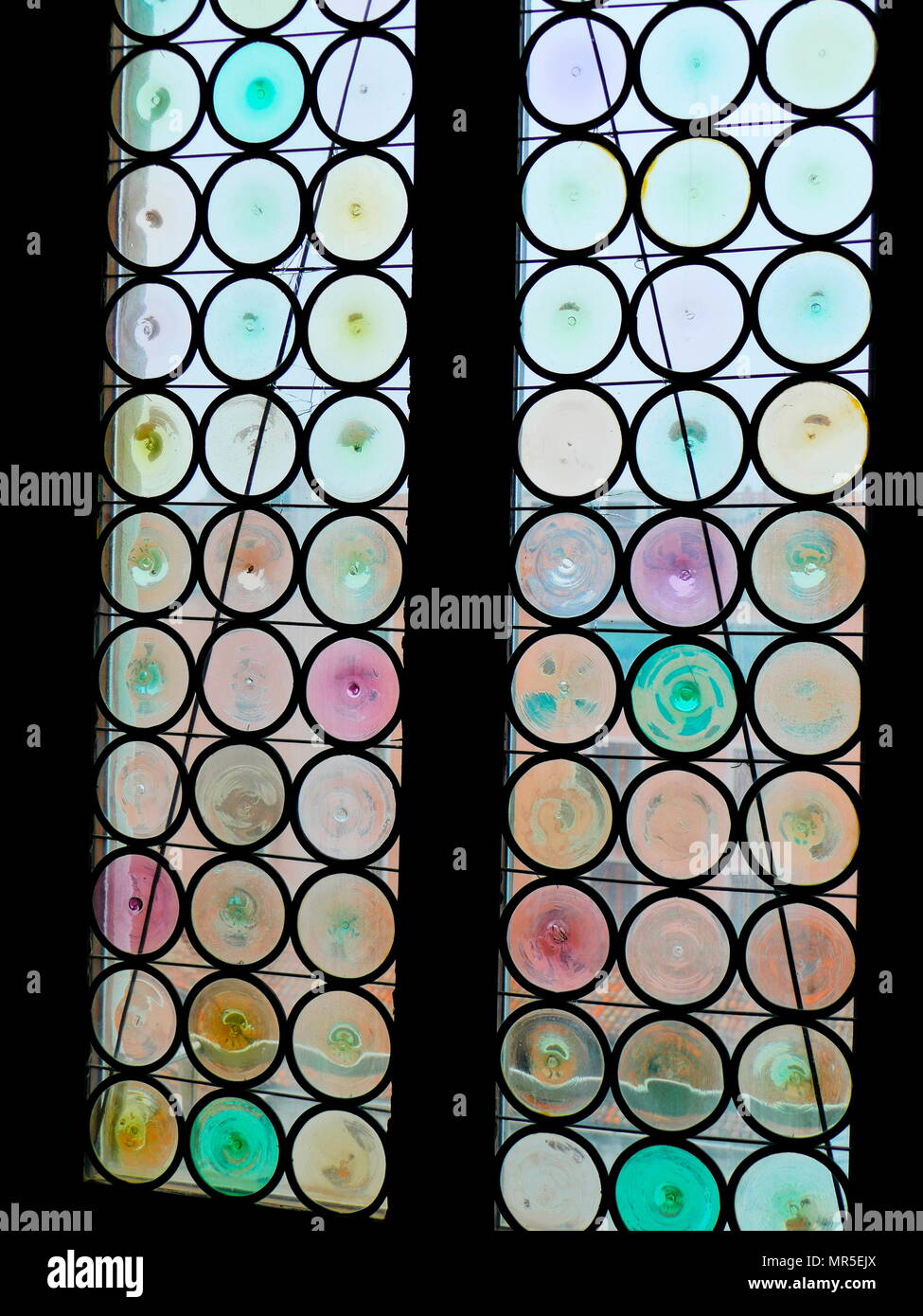 Coloured glass set within the windows of the Doge's Palace; Venice 16th century Stock Photo