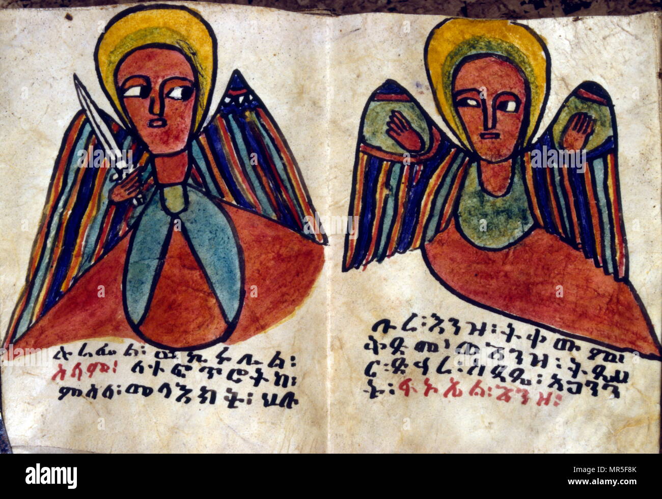19th century Ethiopian Coptic Christian prayer book. Illustration showing two angels. circa 1870 Stock Photo