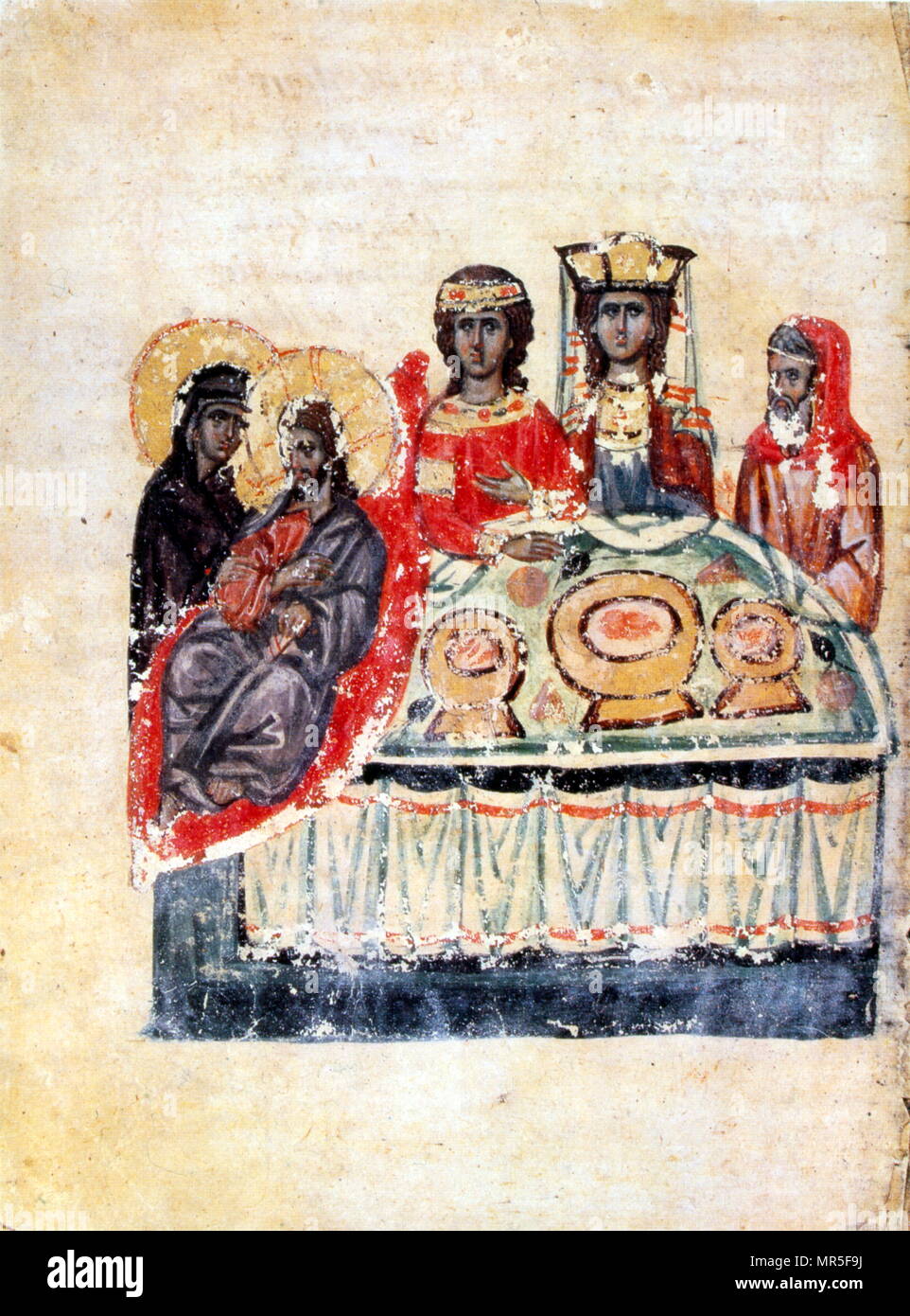 Armenian Christian illustrated manuscript showing the Feast of Cana; the Bible story of the Marriage at Cana, a wedding banquet at which Jesus converts water to wine; 13th century Stock Photo