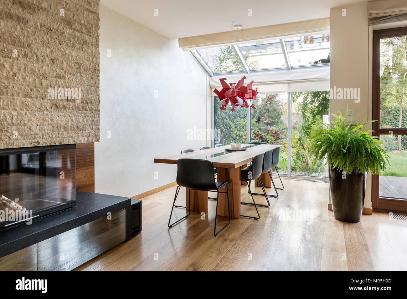 Minimalistic dining area with table and chairs Stock Photo - Alamy - Minimalist Table Leasing Services