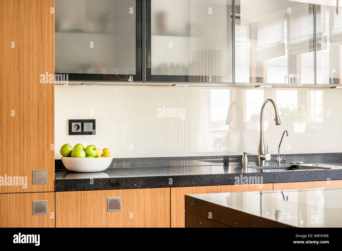 Open plan kitchen with marble countertop Stock Photo Alamy
