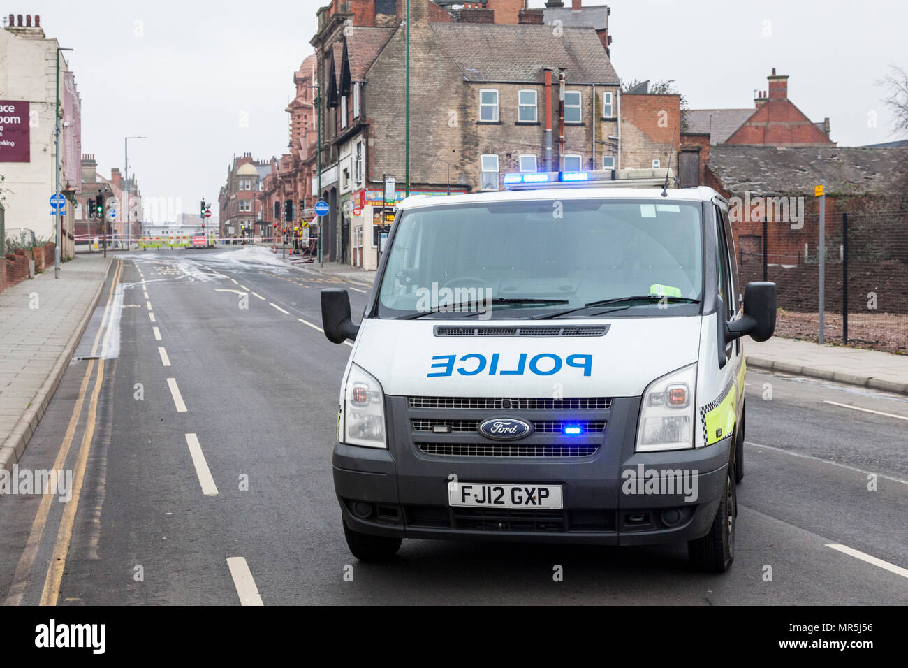 Police vehicle blocking a road, Nottingham, England, UK Stock Photo