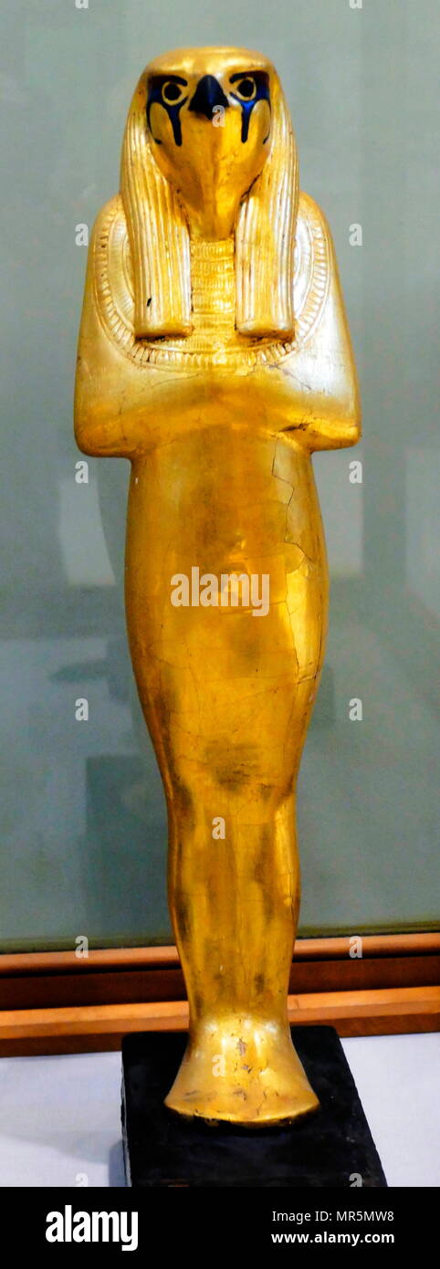 Statuette of Geb. Gilded wood, faience and glass. Thebes, Valley of the Kings, Tomb of Tutankhamen. 1323 BC. 18th dynasty, New Kingdom Stock Photo