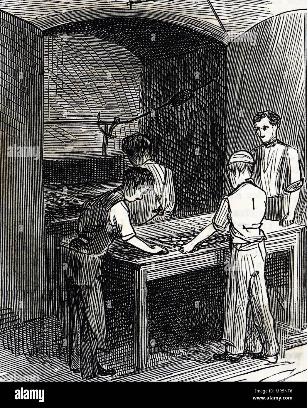 Engraving depicting biscuits being put into the oven at the Peek Frean & Co.'s biscuit factory. Dated 19th century Stock Photo