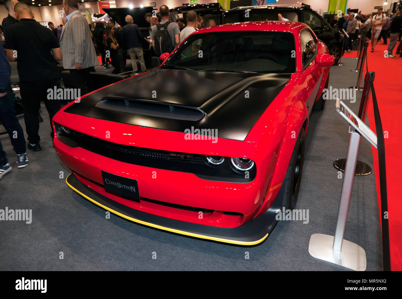 Three-quarter front view of a Dodge Challenger  SRT Demon, on the Clive Sutton Stand, at the 2018 London Motor Show Stock Photo