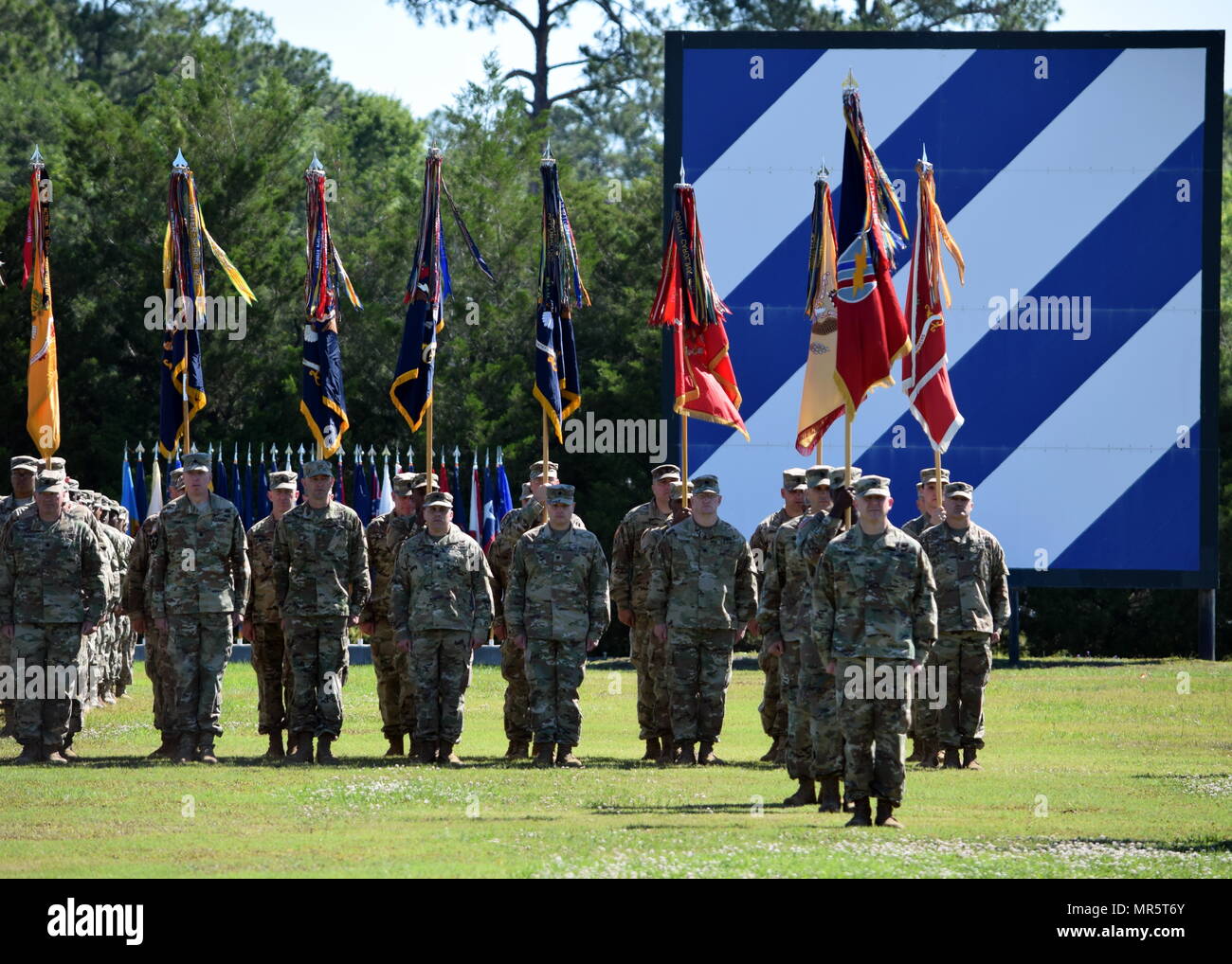 Officers of the Georgia Army National Guard's Macon-based 48th Infantry Brigade Combat Team assembled on Cottrell Field during the 3rd Infantry Division change of command ceremony at Fort Stewart, Ga. With a storied history that predates the American Revolution, the 48th IBCT was associated with the 3rd Infantry Division in 2016. Stock Photo