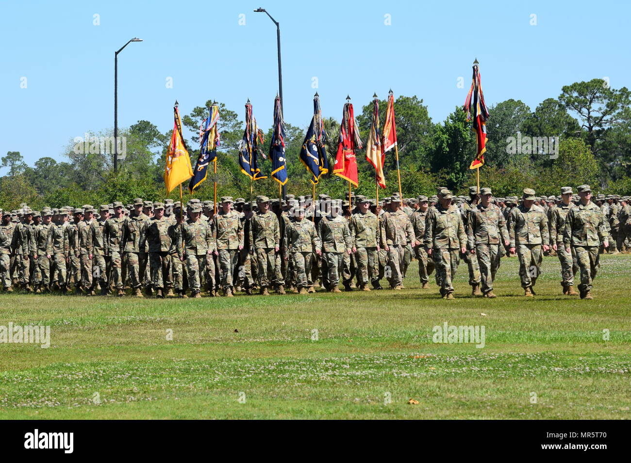 Georgia Army National Guard Soldiers of the Macon-based 48th Infantry Brigade Combat Team march onto Cottrell Field during the 3rd Infantry Division change of command ceremony at Fort Stewart, Ga. With a storied history that predates the American Revolution, the 48th IBCT was associated with the 3rd Infantry Division in 2016. Stock Photo