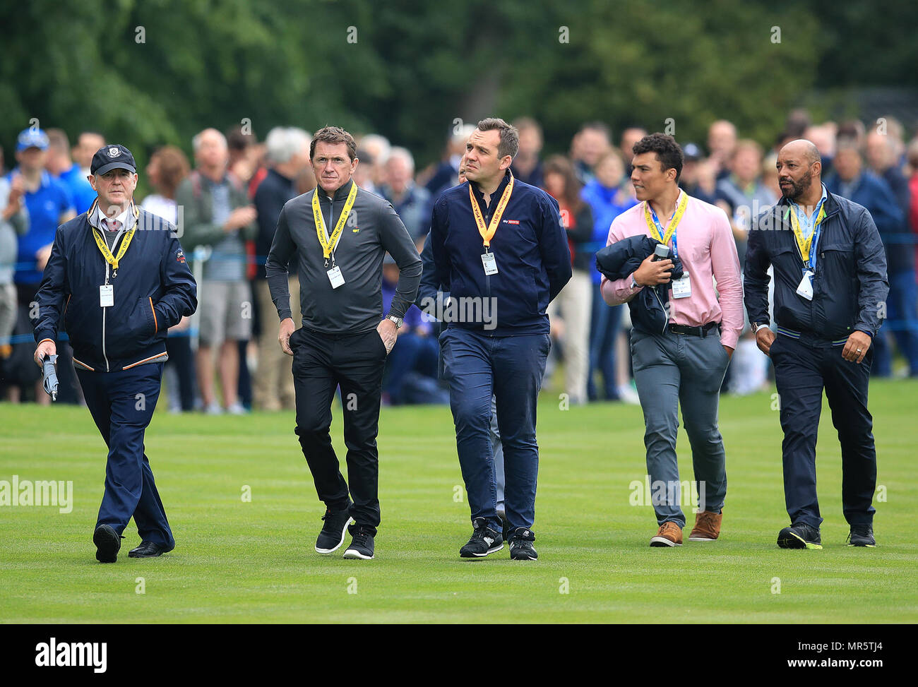 JP McManus (left) and Sir AP McCoy (second left) during day two of the 2018 BMW PGA Championship at Wentworth Golf Club, Surrey. Stock Photo
