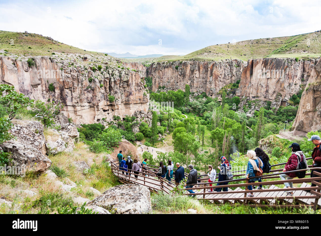 IHLARA VALLEY, TURKEY - MAY 6, 2018: visitors walk to Ihlara Valley in Aksaray Province. Ihlara Valley is 16 km long gorge, it is the most famous vall Stock Photo