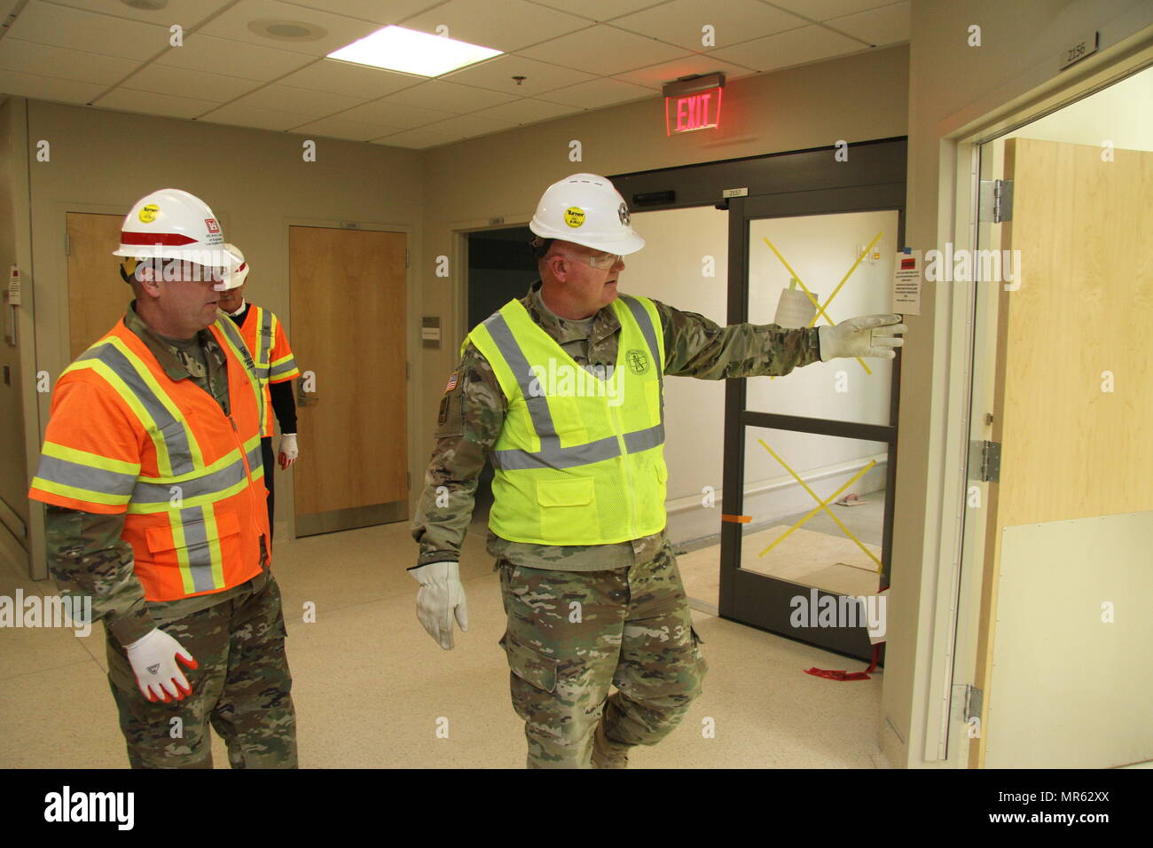 Health Facility Planning Officer Lt. Col. John Smith (right), with the U.S. Army Health Facility Planning Agency shows  U.S. Army Corps of Engineers Deputy Commanding General for Military and International Operations Maj. Gen. Mark Yenter(left) a triage room located within the hospital's emergency department as they toured the new Fort Irwin Weed Army Community Hospital project  at Fort Irwin, California, during a visit here May 15.    Yenter toured several Los Angeles District projects at the National Training Center at Fort Irwin, California, during a visit here May 15. Stock Photo