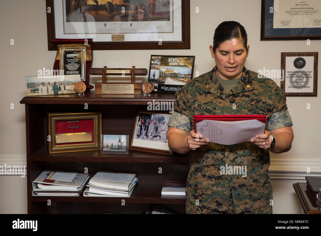 U S Marine Corps Maj Sabrina Villarreal Aide De Camp Director Of Marine Corps Staff Reads The Citation During An Award Ceremony For Sgt Zachary Elflein Admin Non Commissioned Officer Director Of Marine