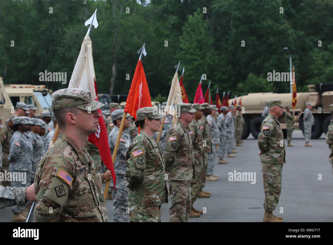 Soldiers from the 518th Sustainment Brigade, stand in formation during