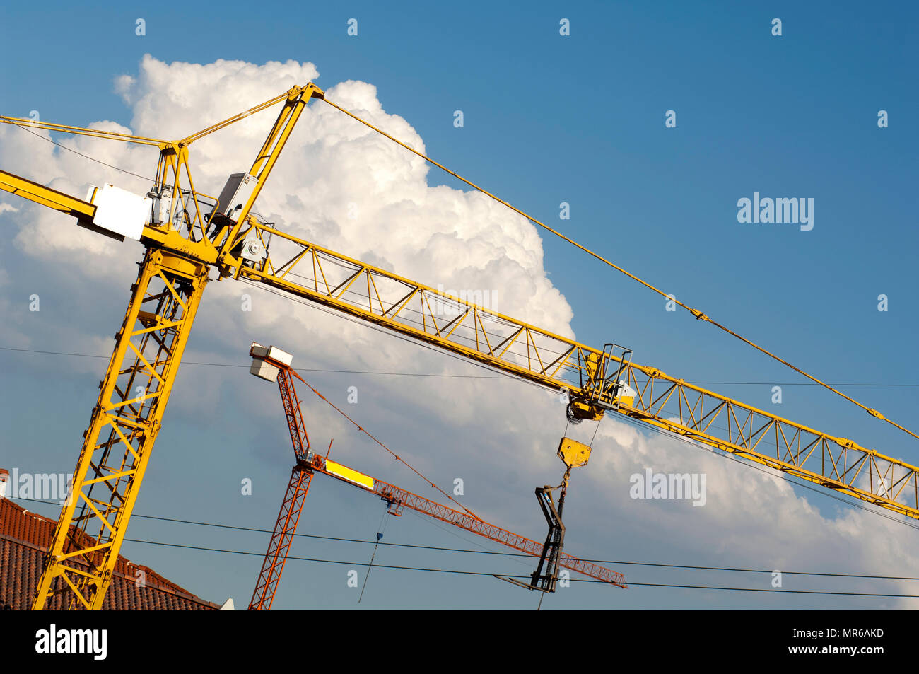 two cranes on a construction side Stock Photo