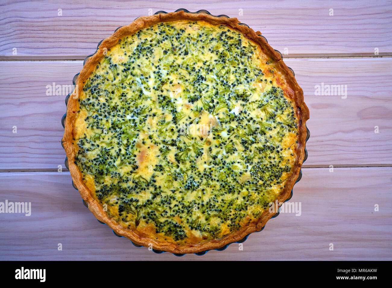 Broccoli quiche french recipe homemade on white wood board Stock Photo