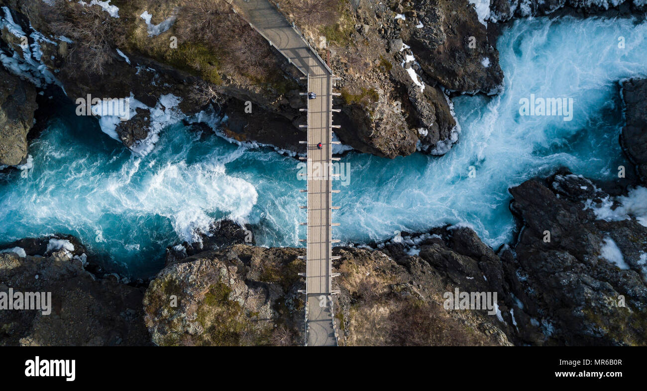 Aerial view, bridge and raging river Hvítá from above, near the Hraunfossar waterfalls, West Island, Iceland Stock Photo