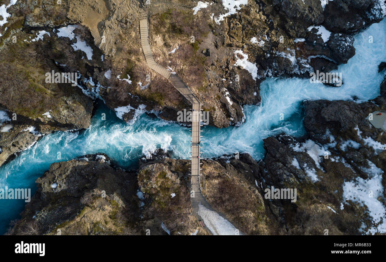 Aerial view, bridge and raging river Hvítá from above, near the Hraunfossar waterfalls, West Island, Iceland Stock Photo