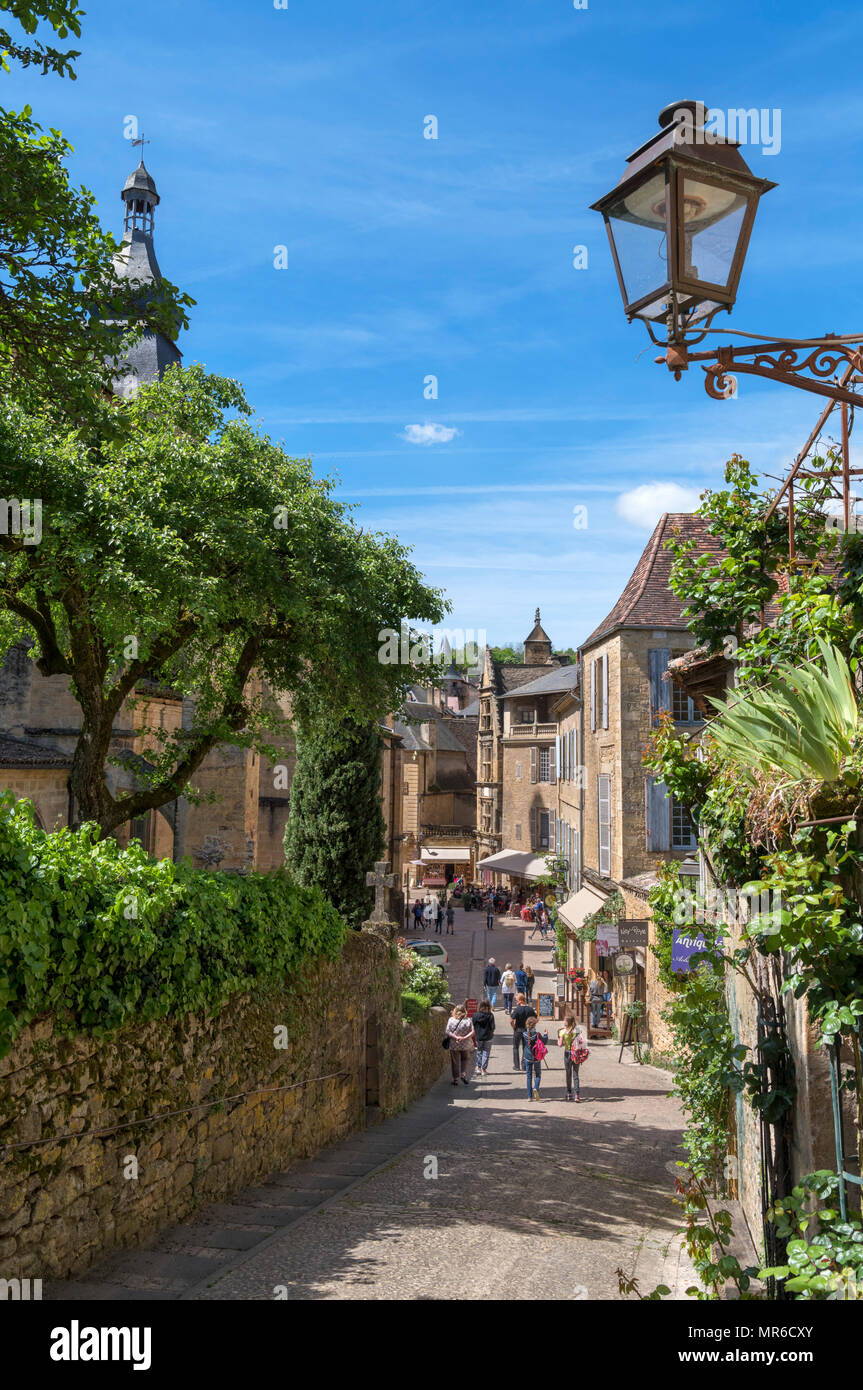 View towards the cathedral in the old town, Rue Montaigne, Sarlat, Dordogne, France Stock Photo