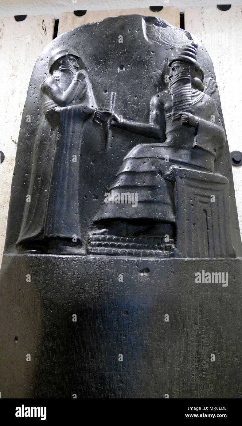 Part of a stele  of the Code of Hammurabi. Hammurabi (c. 1810 BC - 1750 BC), was a king of the First Babylonian Dynasty, reigning from 1792 BC to 1750 BC. Hammurabi is known for the Code of Hammurabi, one of the earliest surviving codes of law in recorded history. Stock Photo