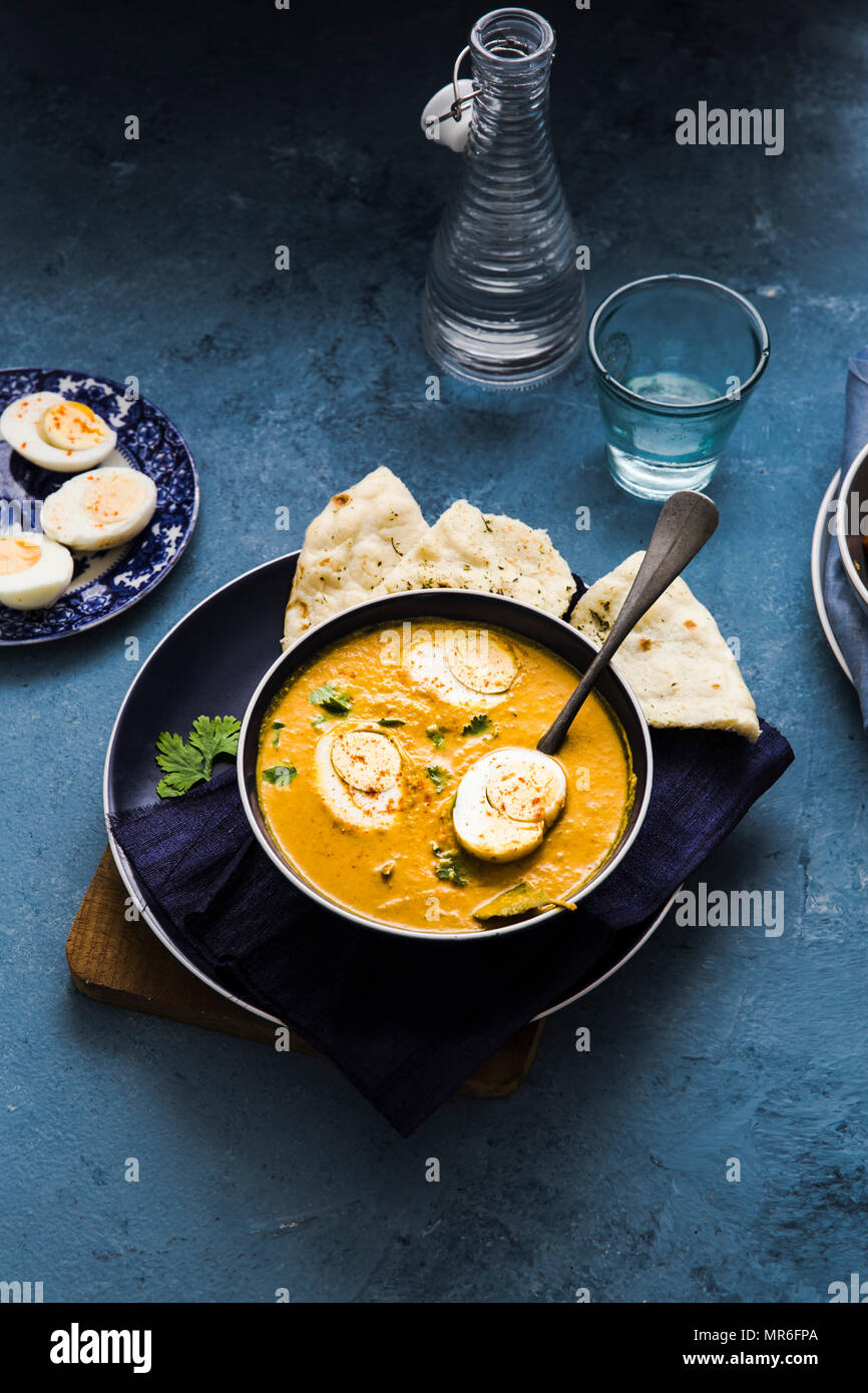 Egg Curry served with Naan Bread Stock Photo Alamy