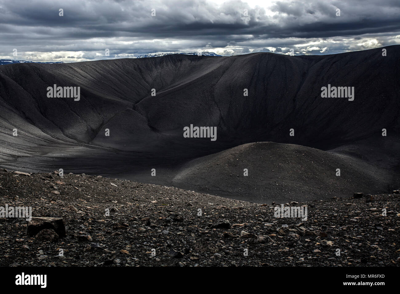 Crater of the volcano Hverfjall, volcanic landscape, near lake Myvatn, dramatic clouds, North Iceland, Iceland Stock Photo