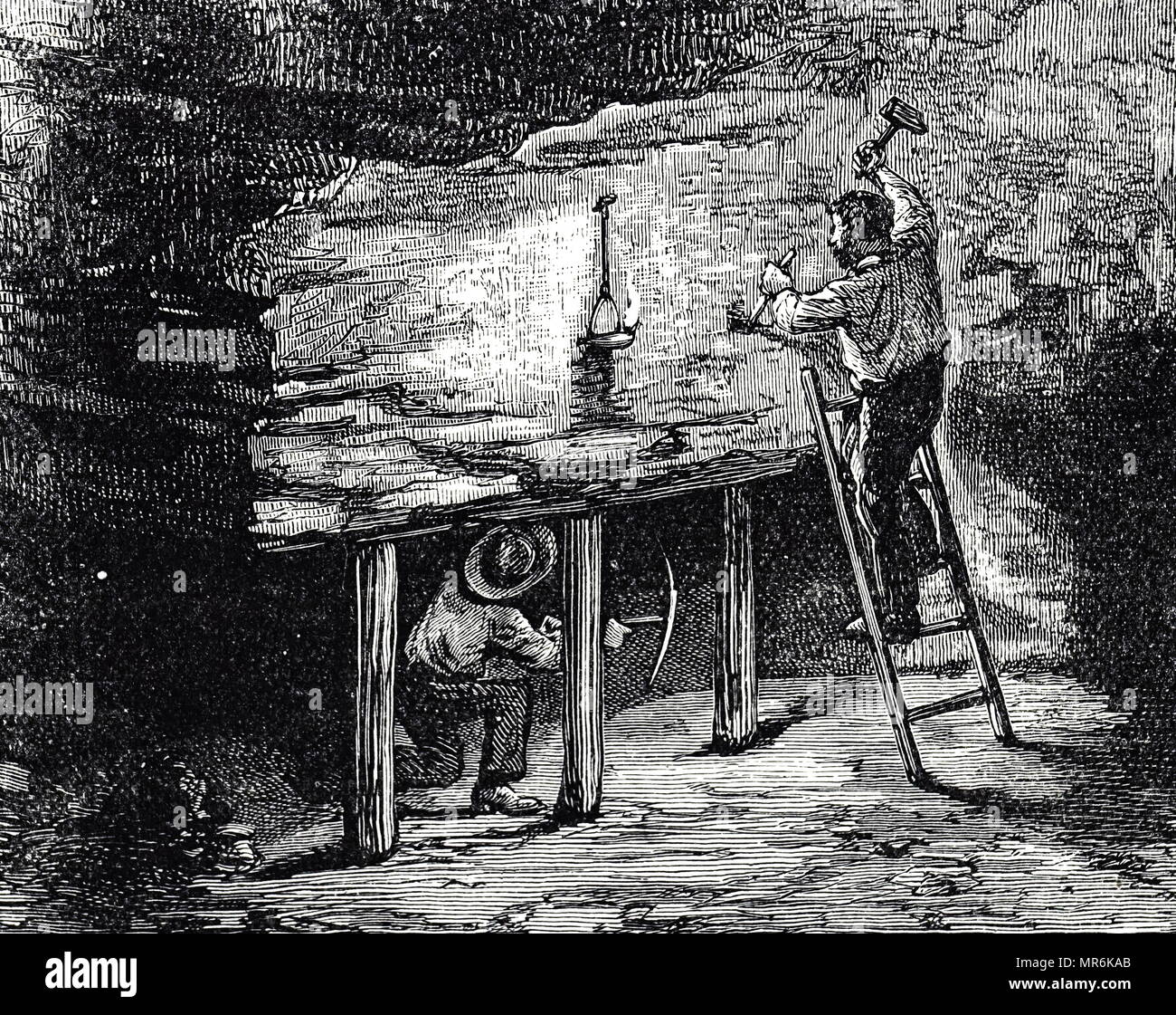 Engraving depicting Cornish miners chipping away tin-bearing quartz rock in a tin mine in the St Just region. Dated 19th century Stock Photo