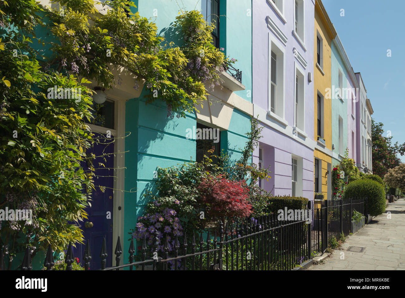 Colourfully painted terraced houses on Falkland Road, Kentish Town