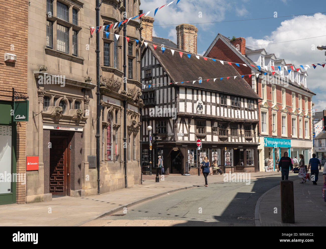 Shoppers on Cross Street in Oswestry Shropshire Stock Photo