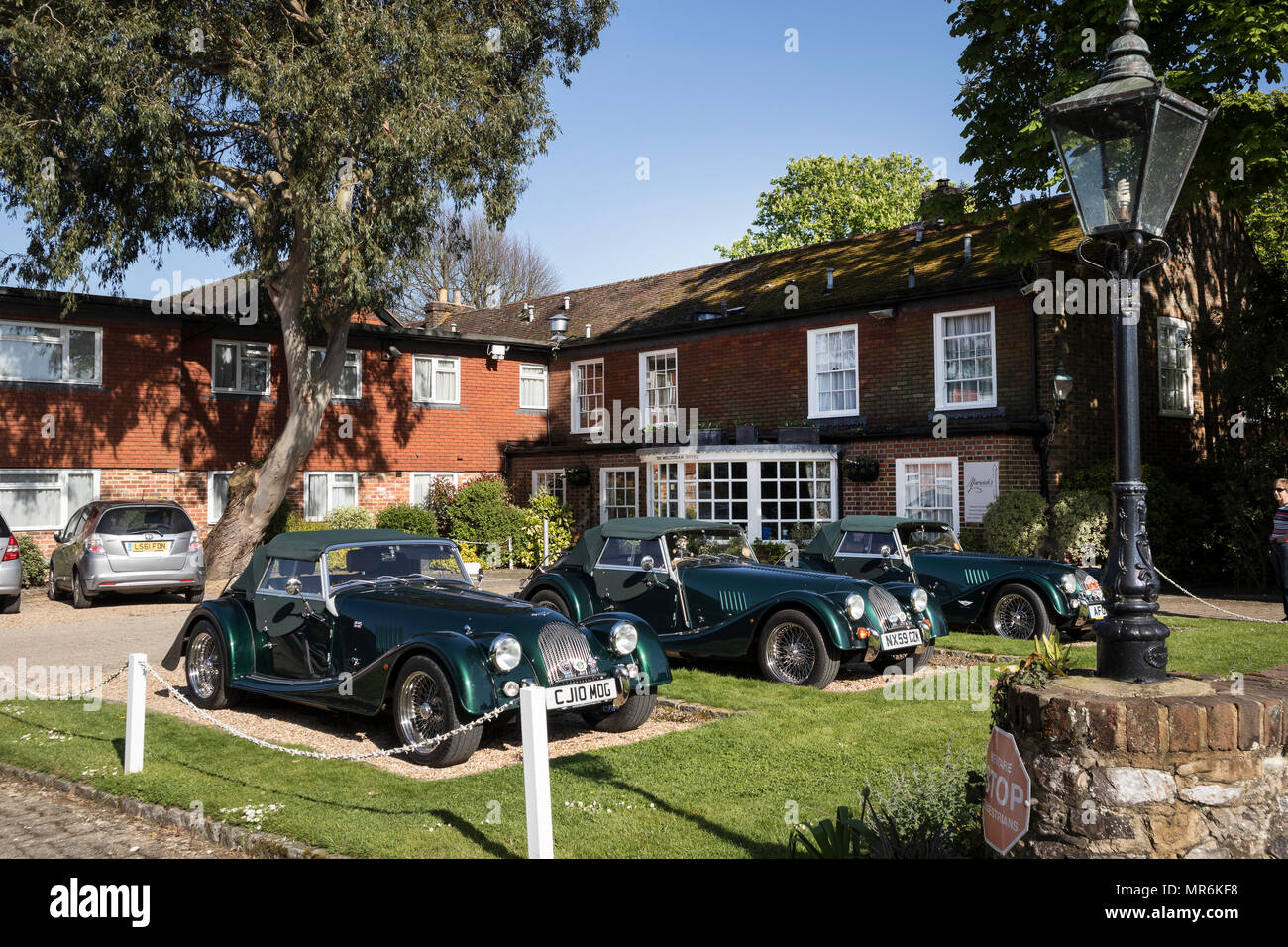 3 Green R100 cars outside The Millstream Hotel at Bosham, Near