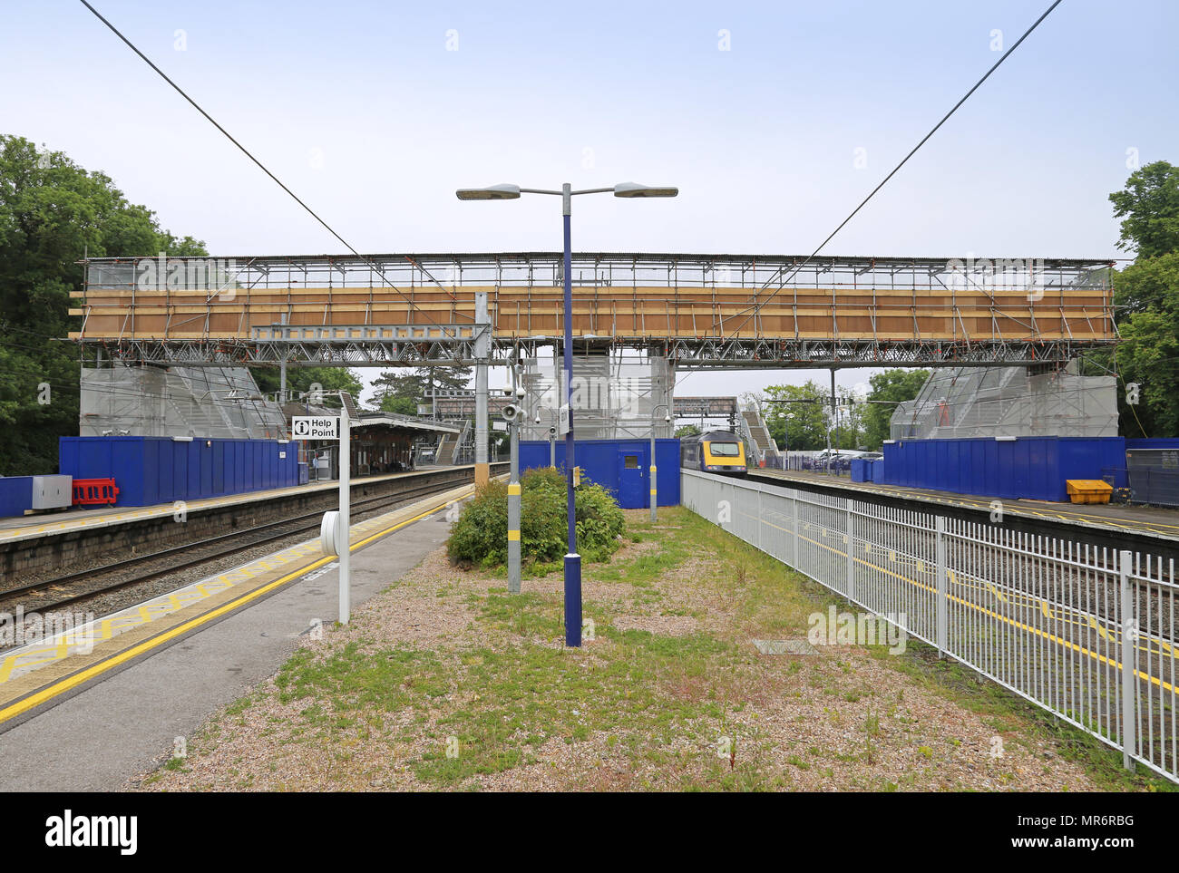 Taplow railway station, west of London, UK. Shows tracks, platforms and temporary footbridge between platforms. Stock Photo