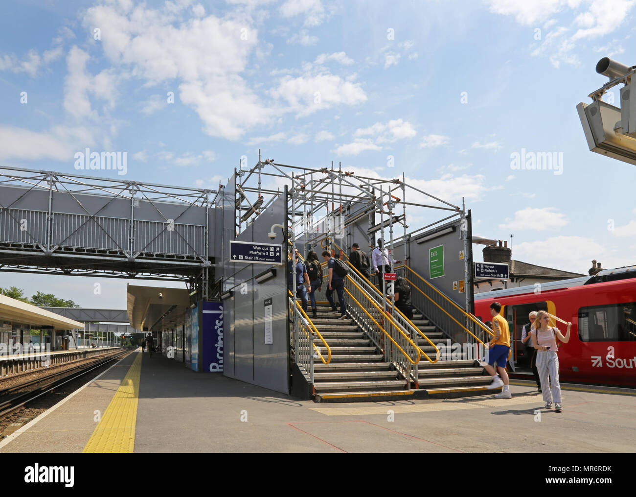 A temporary footbridge provides access between platforms at Twickenham railway station in West London, UK Stock Photo