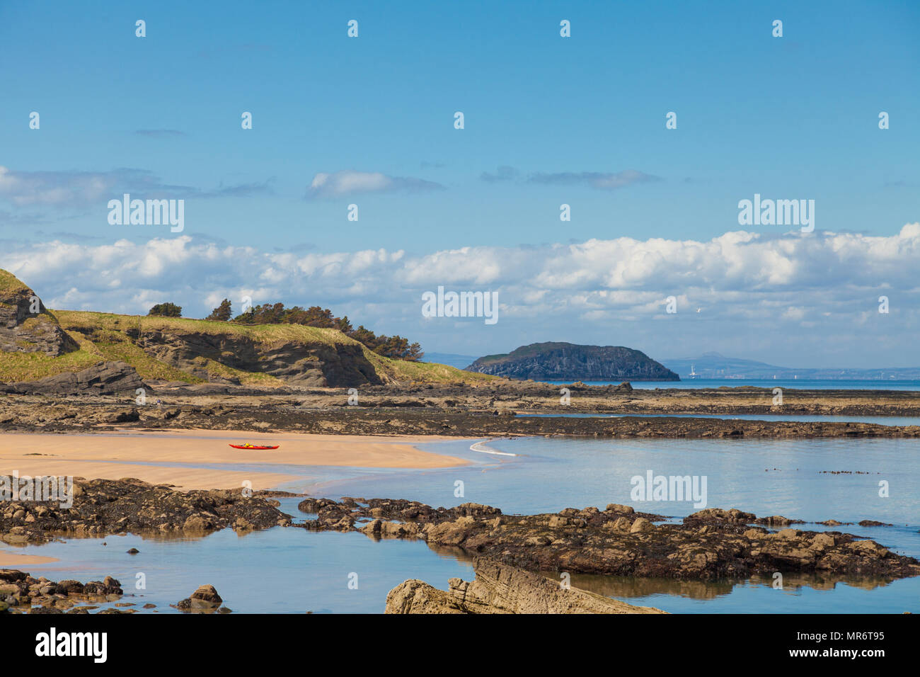 A kayak on the beach near North Berwick with the Island Craigleith in