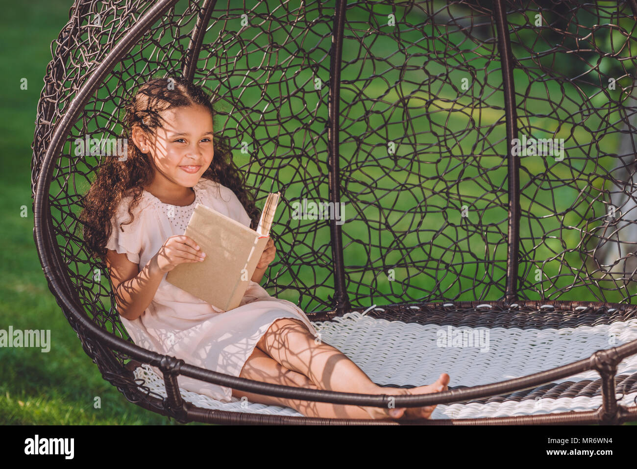 Preteen girl in garden hi-res stock photography and images - Alamy