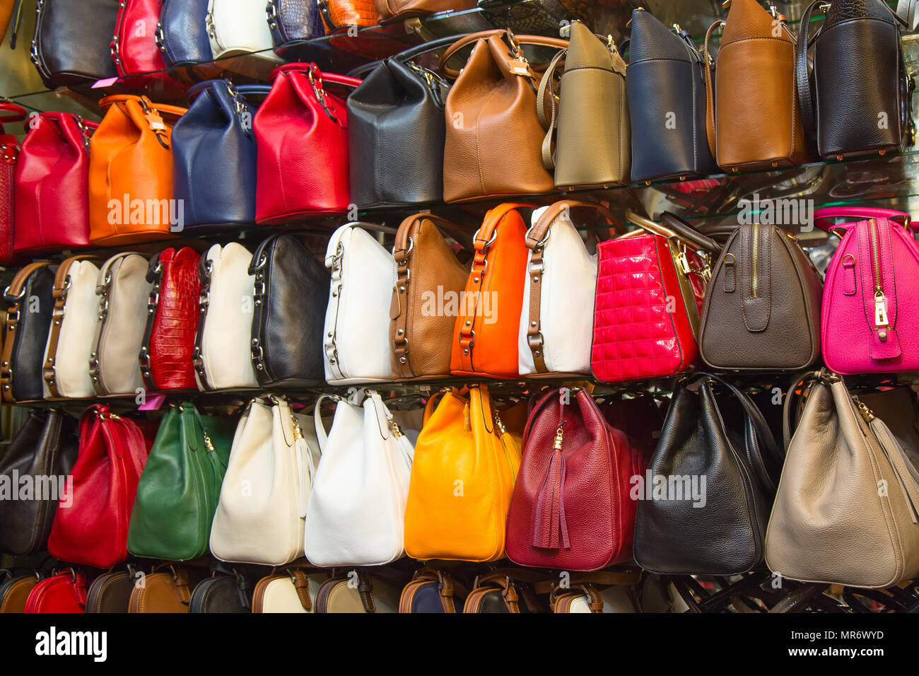 ISTANBUL - MAY 3: Faked bags on sale on the narrow street around Grand Bazaar on Mal 3, 2015 in Istanbul, Turkey. Area around Grand Bazaar is well kno Stock Photo