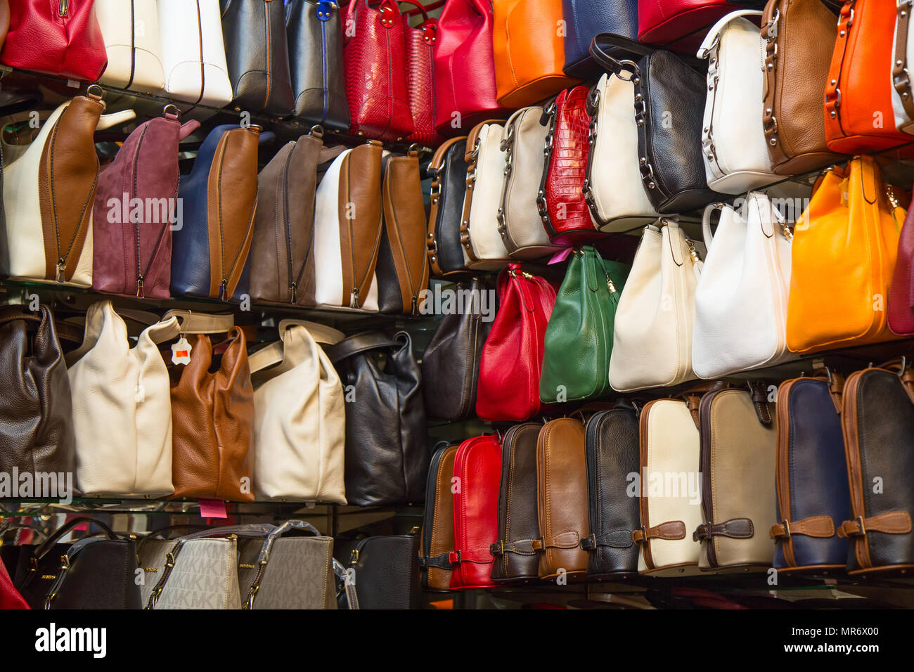 ISTANBUL - MAY 3: Faked bags on sale on the narrow street around Grand Bazaar on Mal 3, 2015 in Istanbul, Turkey. Area around Grand Bazaar is well kno Stock Photo