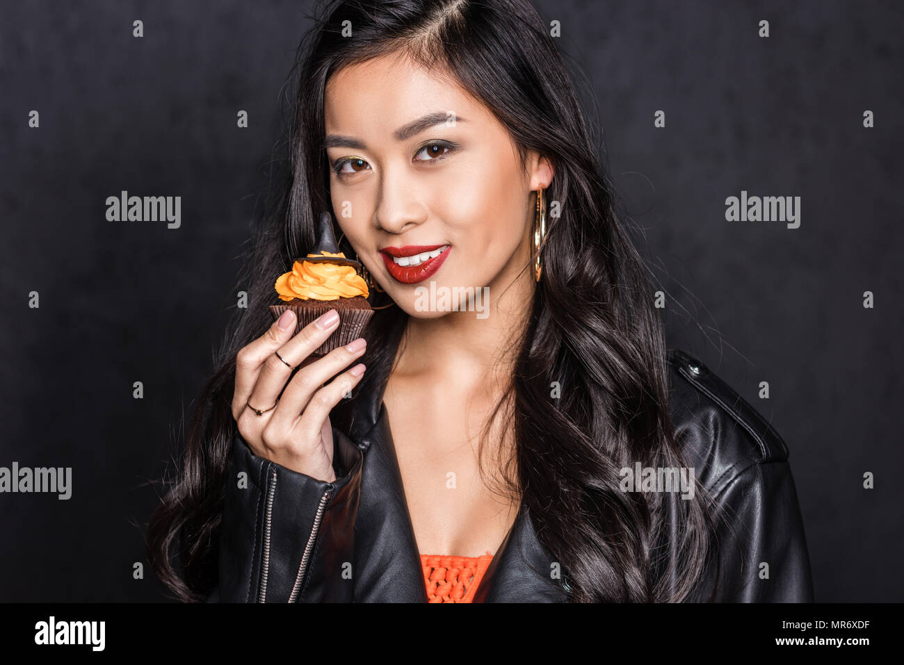 Asian woman in leather jacket hi-res stock photography and images - Alamy