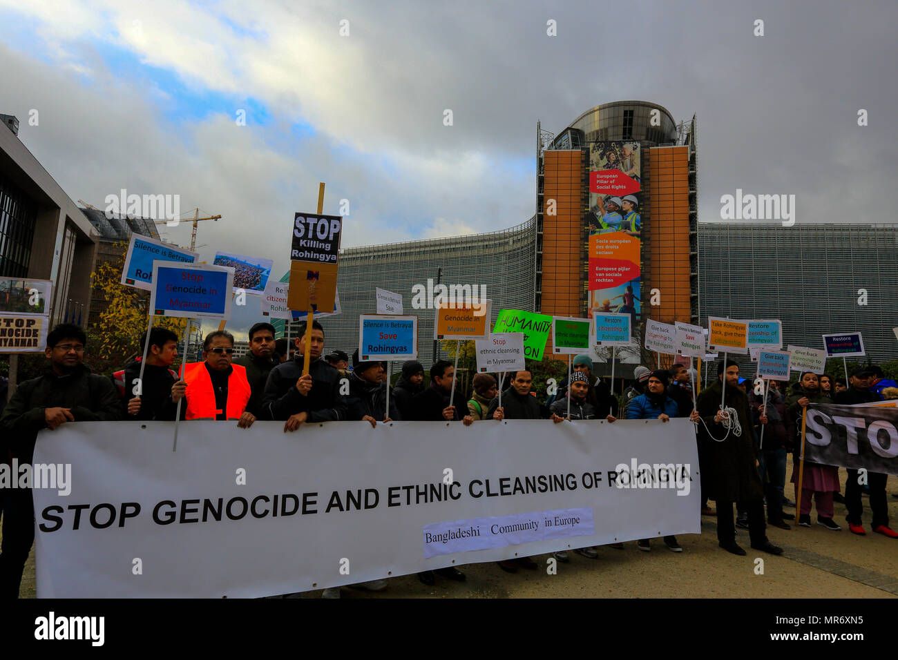 Bangladeshis from European countries demonstrate in front of the European Union headquarters in Brussels calling for an end to the genocide of Rohingy Stock Photo