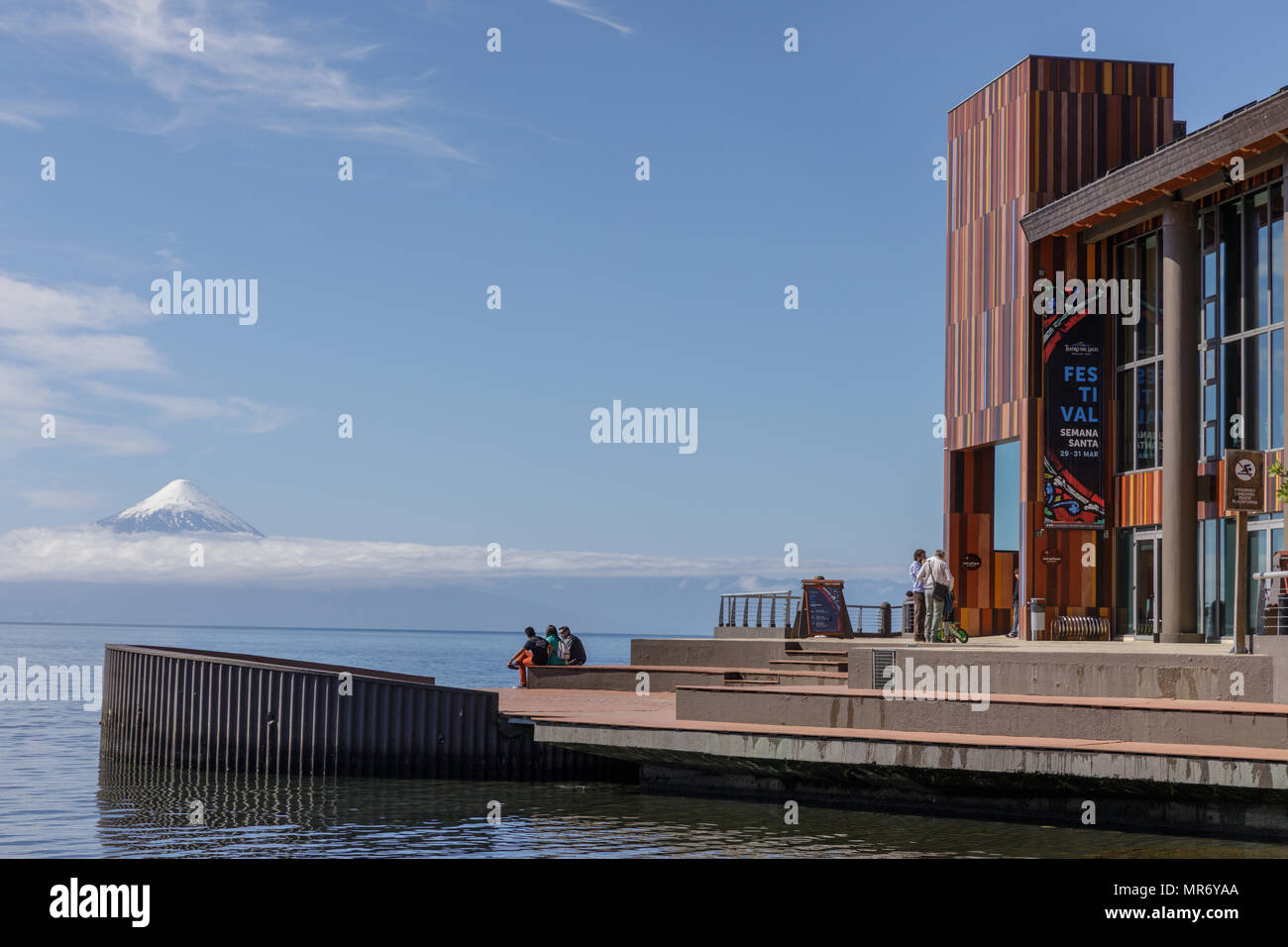 Frutillar, Lakes District, Chile: Teatro del Lago extends out over Lago Llanquihue, Osorno Volcano looms to the east. Stock Photo