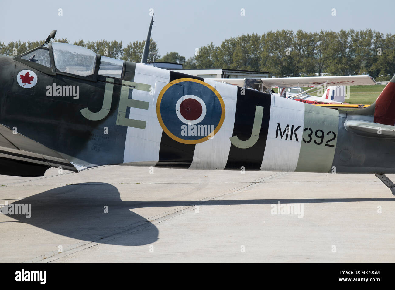 A vintage Spitfire MK 392 parked at Goodwood Aerodrome at Goodwood, Sussex,  UK. This plane was flown by Air Vice Marshal James Edgar Johnson, CB, CBE Stock Photo