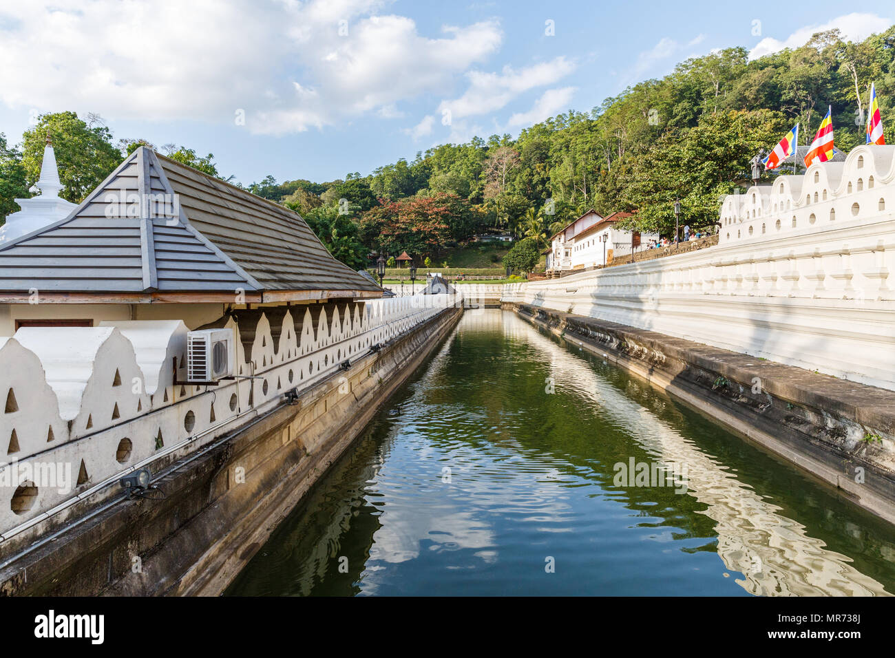 Scenic view of beautiful antique architecture with river in kandy, sri ...