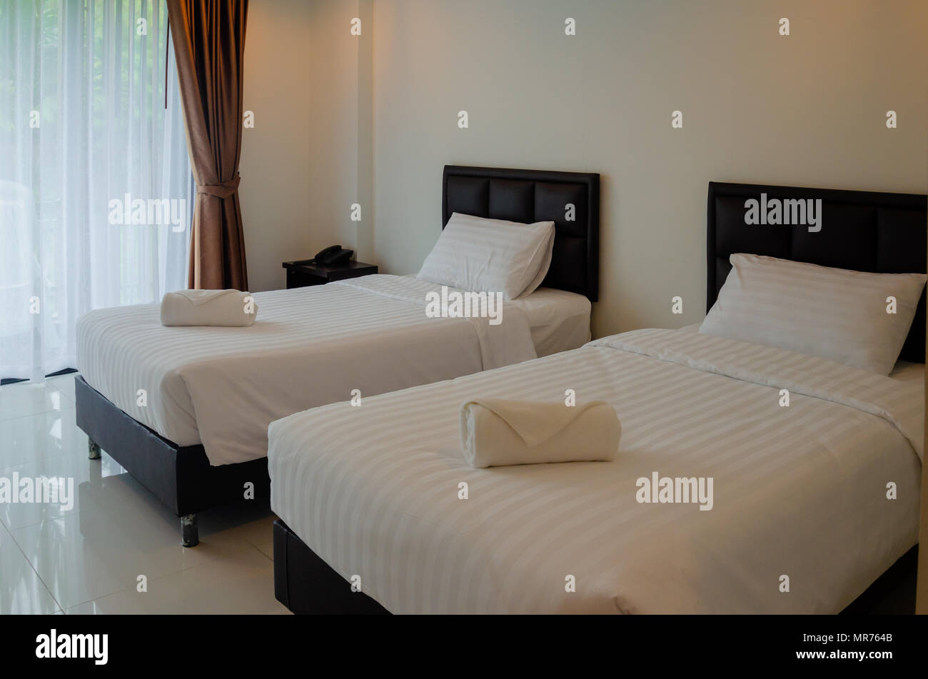 Modern hotel beds in the bedroom.Interior design Stock Photo Alamy