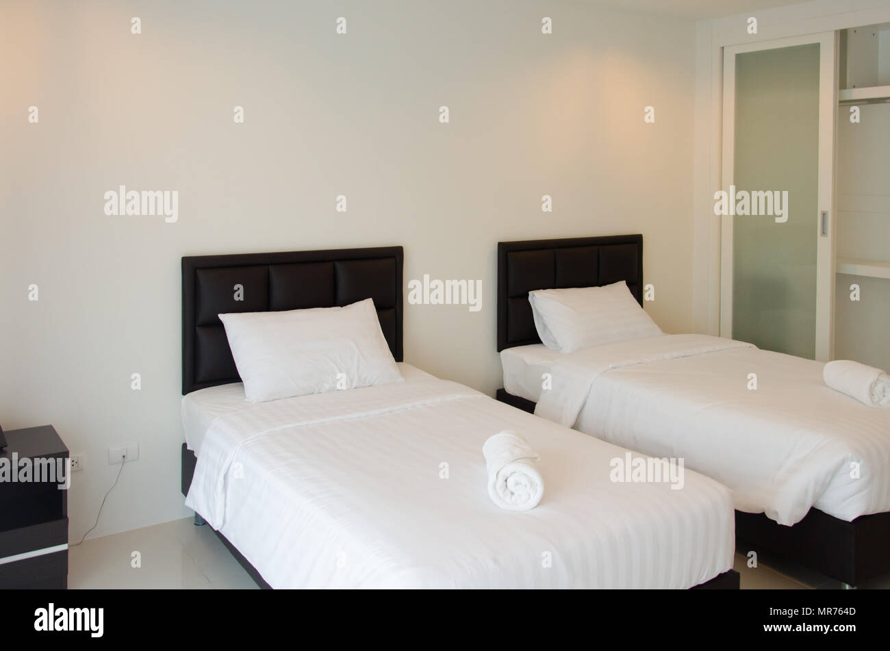 Modern hotel beds in the bedroom.Interior design Stock Photo Alamy