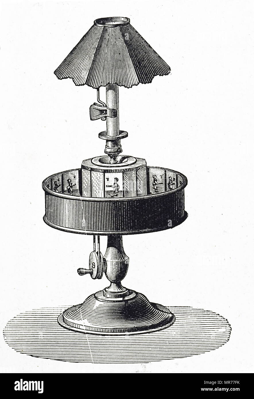 Engraving depicting Charles-Émile Reynaud's praxinoscope. A painted strip with figures was placed inside the circumference of the drum which was rotated. The image reflected in the mirrors in the centre of the apparatus gave the impression of a continuous moving picture. Charles-Émile Reynaud (1844-1918) a French inventor. Dated 19th century Stock Photo