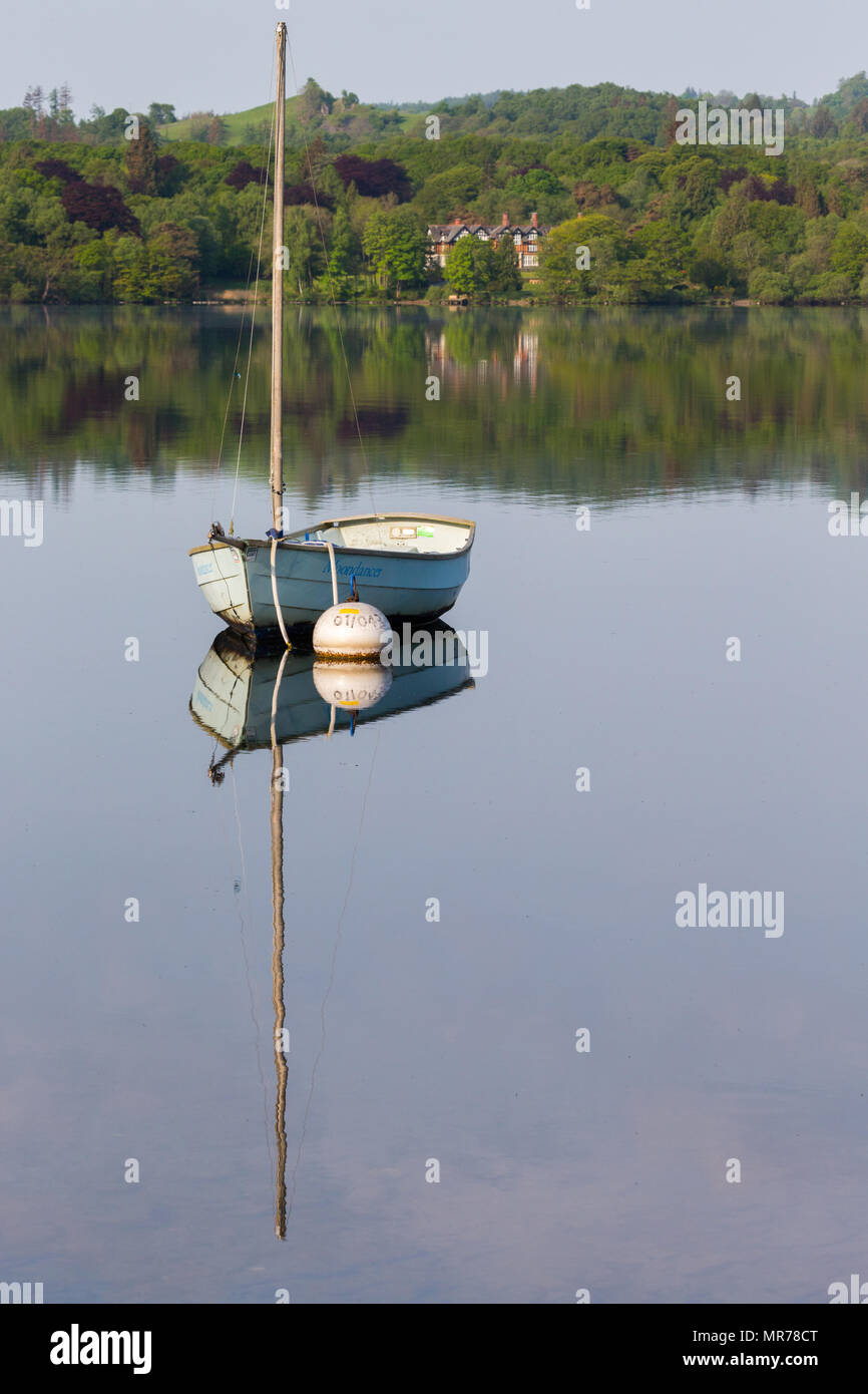 A small sailing Dinghy moored on Lake Windermere, Cumbria, UK Stock