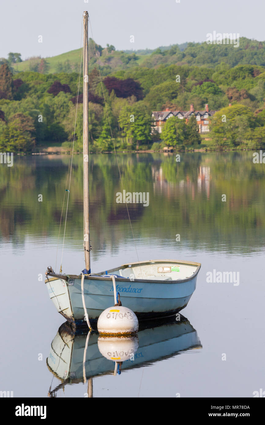 A small sailing Dinghy moored on Lake Windermere, Cumbria, UK Stock Photo