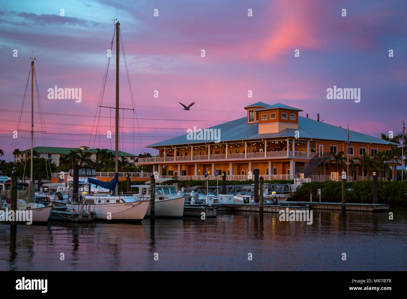 Dusk over Laishley Crab House on the Peace River waterfront in Punta Gorda Florida Stock Photo