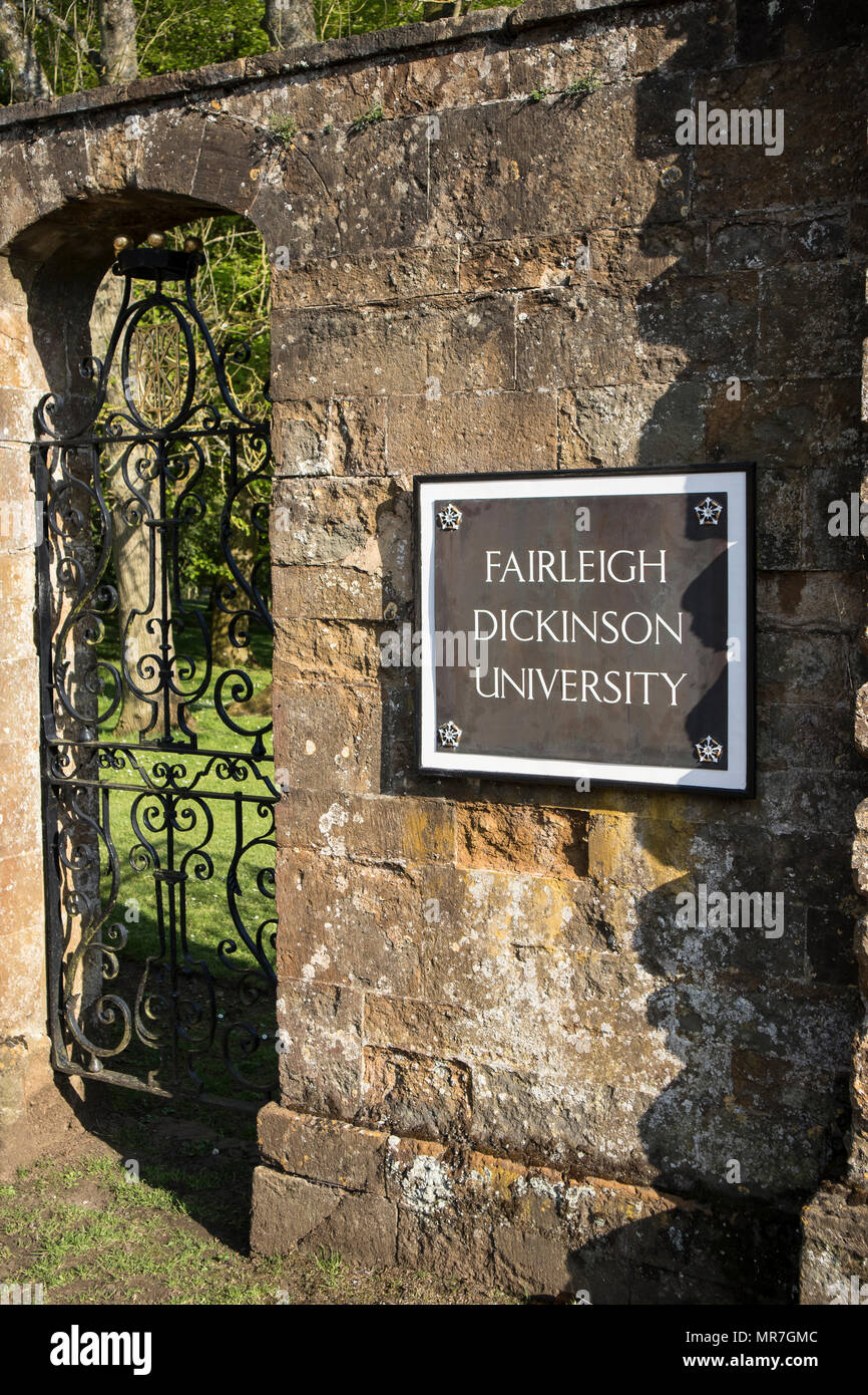 An old entrance gate sign to Fairleigh Dickinson University, formerly Wroxton College at Wroxton, near Banbury, Oxfordshire Stock Photo