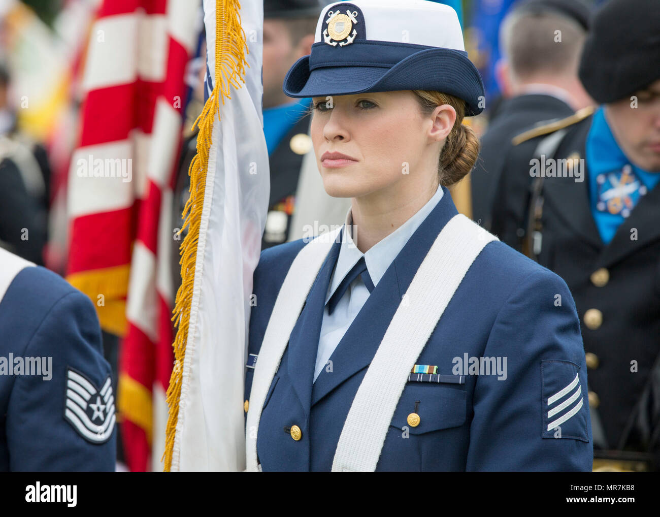 A member of the Defense Information Systems Agency Color Guard waits ...