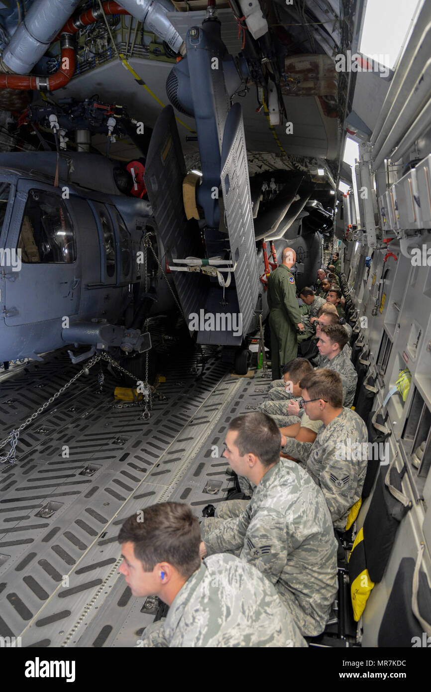 Members of the 38th Rescue Squadron and 723d Aircraft Maintenance