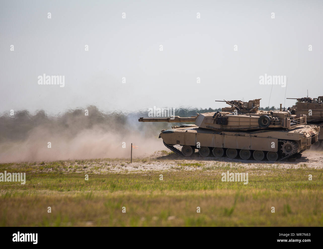 Marines fire their M1A1 Abrams tanks at simulated enemy positions for ...